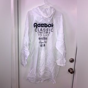 NWT Reebok Long Length Lightweight Windbreaker Hooded Jacket Poncho